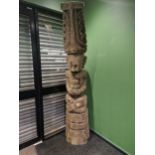 AN INTERESTING FAR EASTERN CARVED HARDWOOD TOTEM.