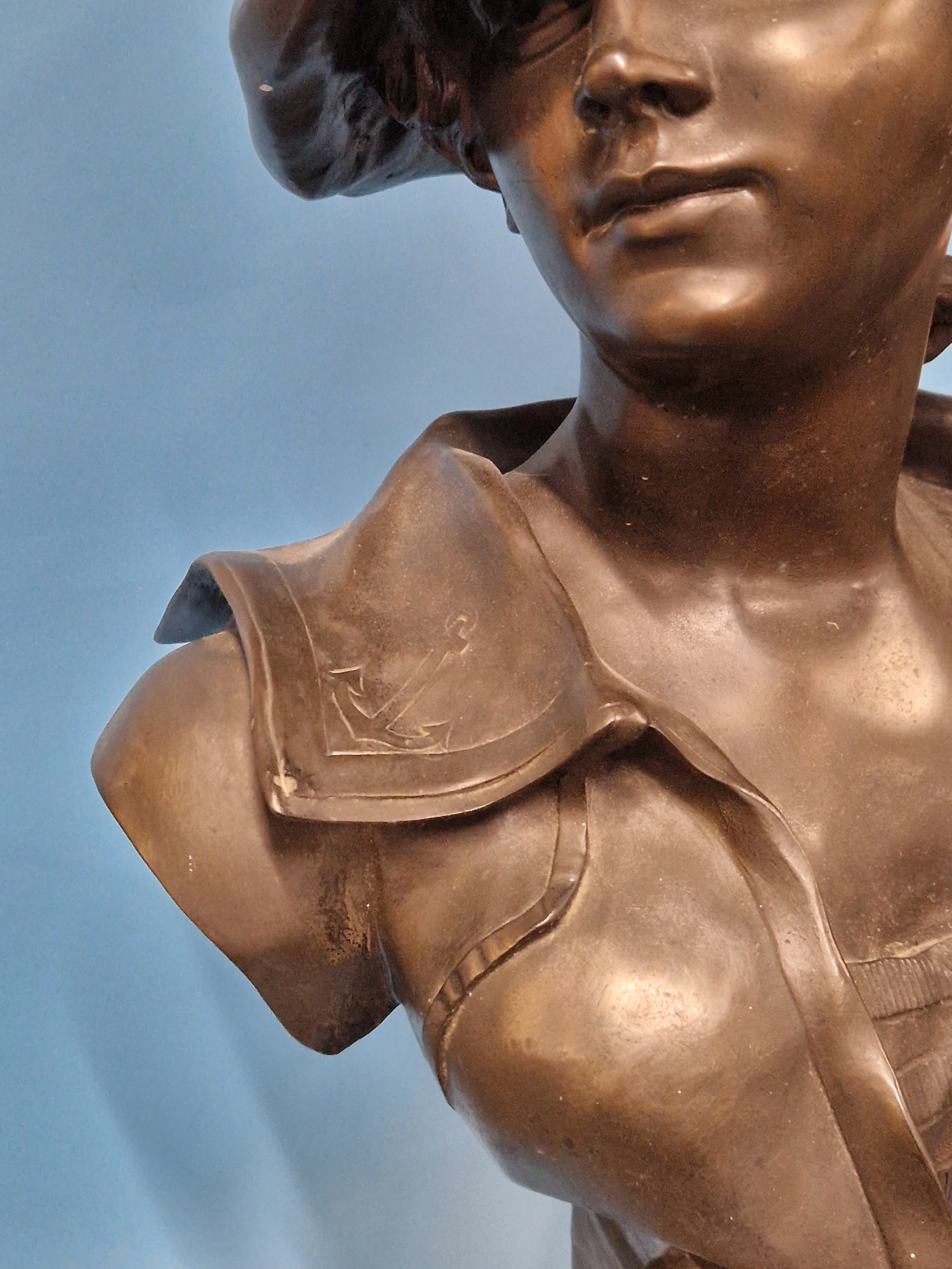 A BRONZED COMPOSITION BUST LABELLED LA CANOTIERE PAR DUTRION, SHE WEARS A CAP AND HAS ANCHORS ON THE - Image 7 of 10