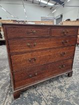 A 19th C. OAK CHEST OF TWO SHORT AND THREE GRADED LONG DRAWERS ON BRACKET FEET. W 123 x D 56 x H