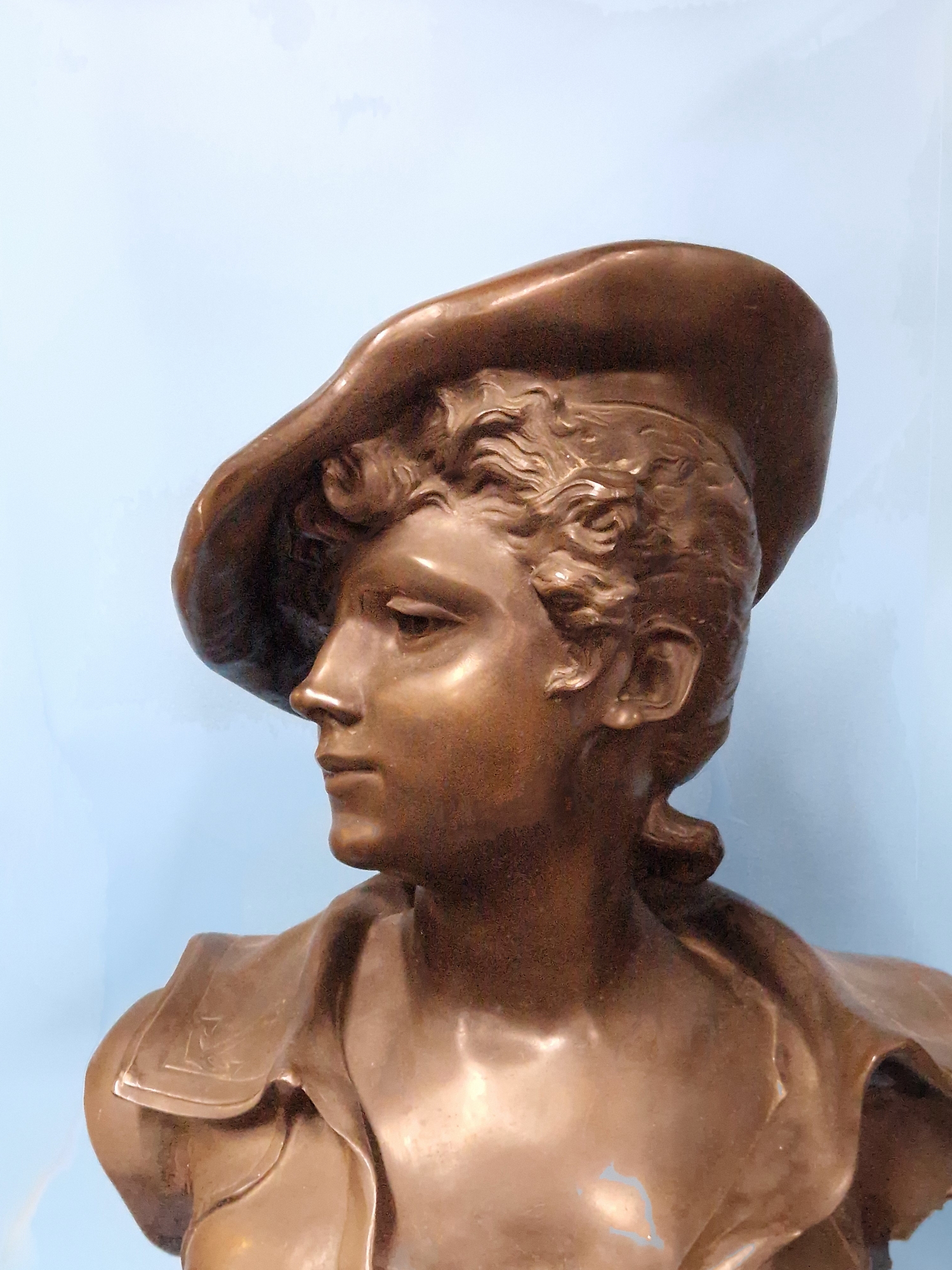 A BRONZED COMPOSITION BUST LABELLED LA CANOTIERE PAR DUTRION, SHE WEARS A CAP AND HAS ANCHORS ON THE - Image 3 of 10