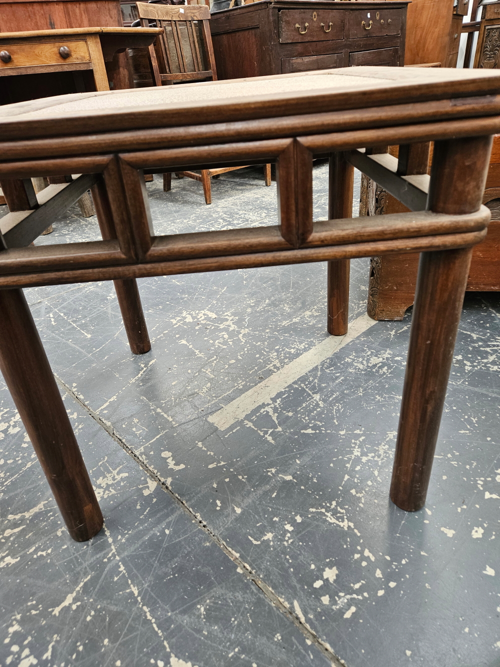 A CHINESE HARDWOOD TABLE, THE CANE INSET TOP ABOVE AN OPEN WORK APRON AND FOUR CYLINDRICAL LEGS.   W - Image 8 of 10