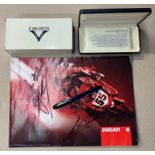 A DUCATI 2005 SALE BROCHURE SIGNED BY CARL FOGARTY TOGETHER WITH A VISCONTI /DUCATI PEN (BOXED)