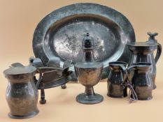 PEWTER: TWO OVAL DISHES, A BRAZIER, A CASTER, TWO SPIRIT MEASURES, A LIDDED PINT MUG AND A HALF PINT