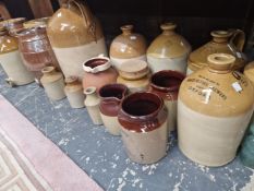 A COLLECTION OF VINTAGE POTTERY FLAGONS AND BARRELS