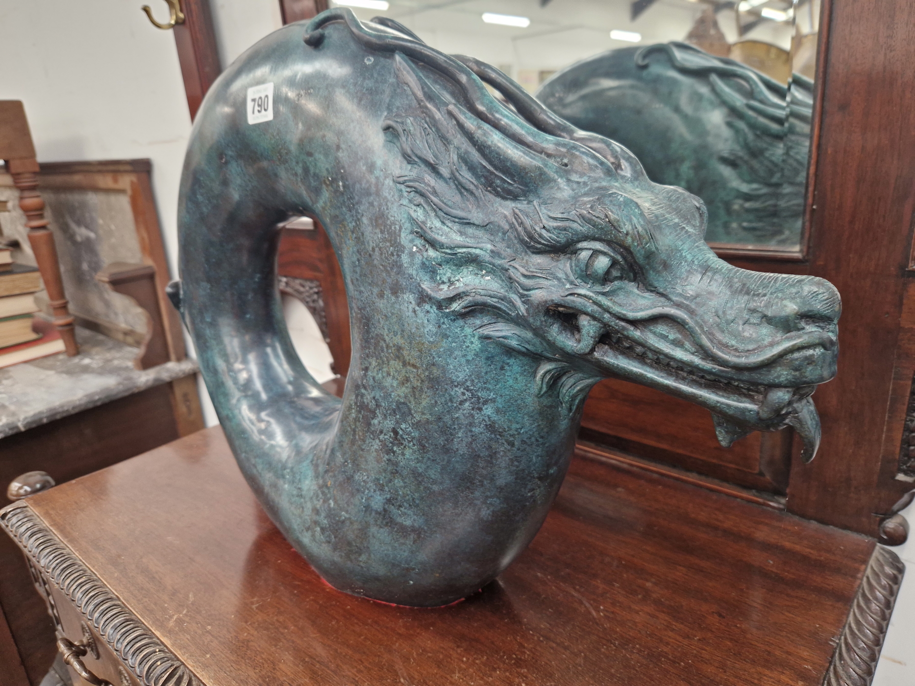 A BRONZE SCULPTURE OF A DRAGON WITH A CIRCULAR BODY. H 39cms. - Image 2 of 4