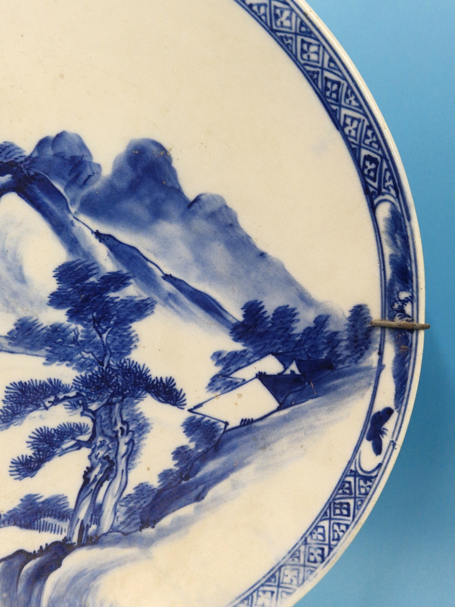 A PAIR OF CHINESE BLUE AND WHITE CHARGERS PAINTED WITH MOUNTAINOUS ISLANDS, A BUFFALO ON ONE AND A - Image 5 of 14