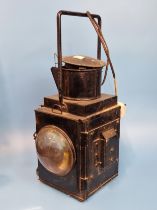A BRITISH RAIL LANTERN WITH TWO WINDOWS OF CLEAR MAGNIFYING GLASS, NOW WITH AN ELECTRIC LIGHT