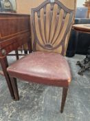 A PAIR OF MAHOGANY SHIELD BACK CHAIRS WITH STUFFED SEATS ABOVE CHANNELLED TAPERING SQUARE FRONT