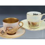 TWO ROYAL WORCESTER COFFEE CUPS AND SAUCERS, ONE PAINTED WITH CATTLE BY STINTON 1933 AND THE OTHER