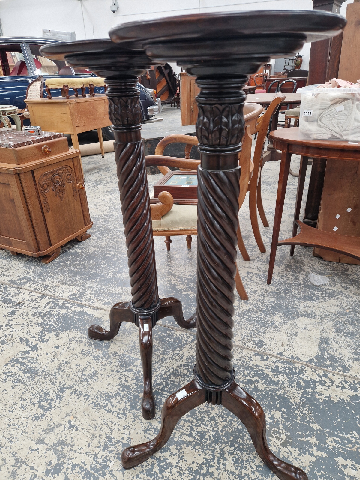 A PAIR OF MAHOGANY TORCHERES, THE DISHED CIRCULAR TOPS ON SPIRAL TWIST COLUMNS AND TRIPODS - Image 7 of 7