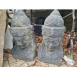 AN IMPRESSIVE PAIR OF LARGE EASTERN DEITY HEADS