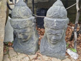 AN IMPRESSIVE PAIR OF LARGE EASTERN DEITY HEADS