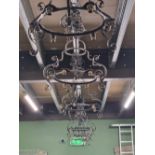 A SET OF SIX ECCLESIASTICAL WROUGHT IRON CHANDELIER LIGHT FITTINGS