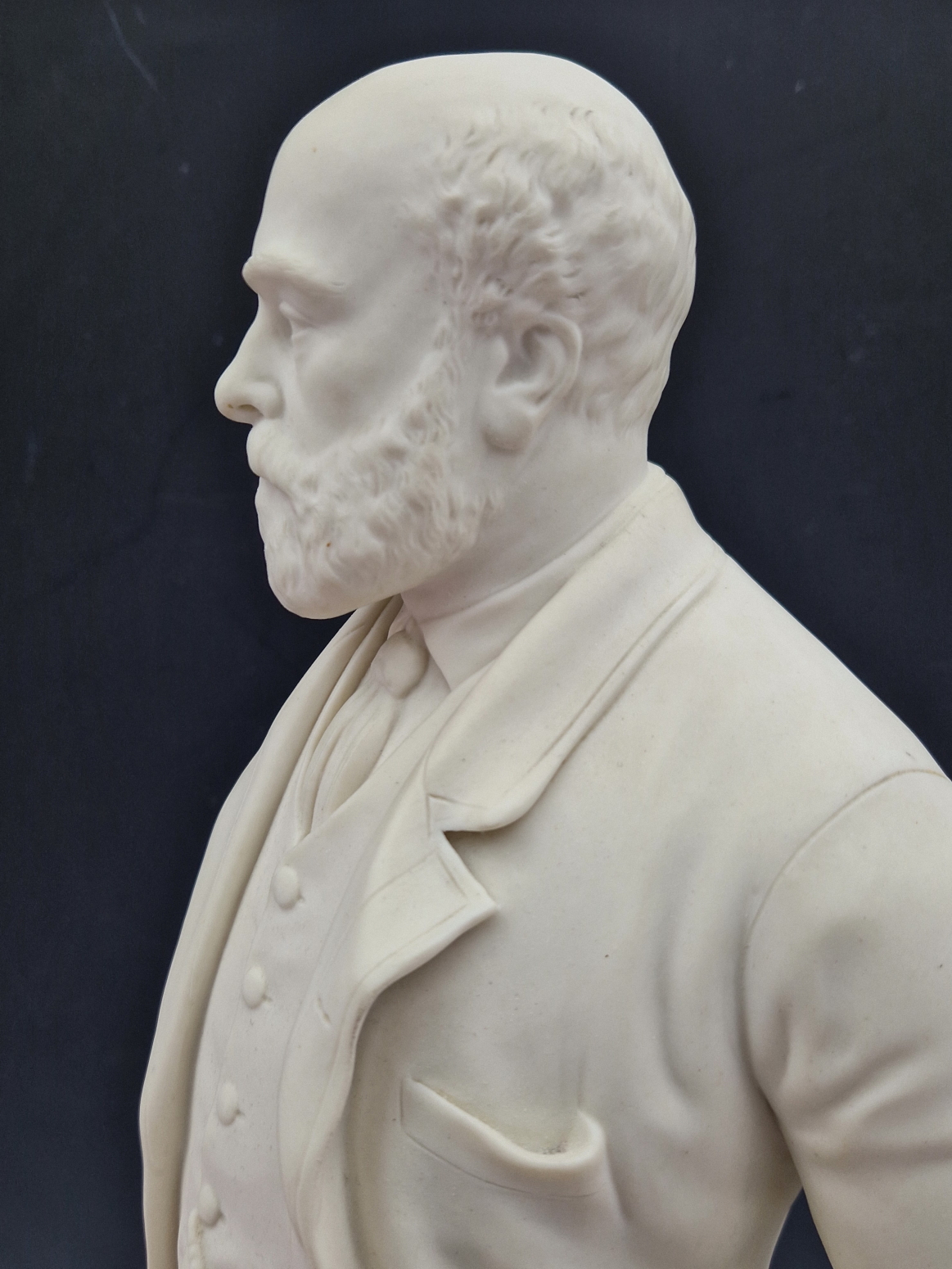 A 19th C. PARIAN FIGURE OF COLIN MINTON CAMPBELL STANDING HOLDING A CUP ON A COLUMN MOULDED THIS - Image 9 of 11