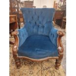 A VICTORIAN MAHOGANY ARM CHAIR BUTTON UPHOLSTERED IN BLUE VELVET