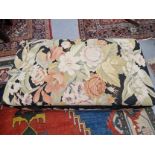 A FLORAL MACHINE WOVEN TAPESTRY COVERED OTTOMAN WITH A CUSHIONED RECTANGULAR LID. W 145 x D 78 x H