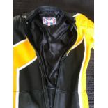 VINTAGE MIKE WILLIS MW LEATHERS. MOTORCYCLE RACING ONE PIECE SUIT YELLOW WHITE AND BLACK.