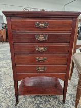 AN EDWARDIAN MUSIC CABINET.