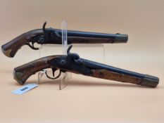 A PAIR OF SWEDISH PERCUSSION CAP PISTOLS WITH BRASS MOUNTED BUTTS, TRIGGER GUARDS AND MUZZLES