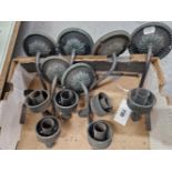 A SET OF SIX DARKLY PATINATED BRONZE WALL LIGHTS, AS RETAILED BY CHARLES EDWARDS, EACH WITH A SINGLE