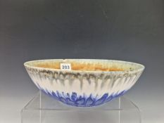 A 1932 RUSKIN HIGH FIRED BOWL,M THE STREAKY COLOURS OF THE INTERIOR TONING FROM GREY THROUGH BROWN
