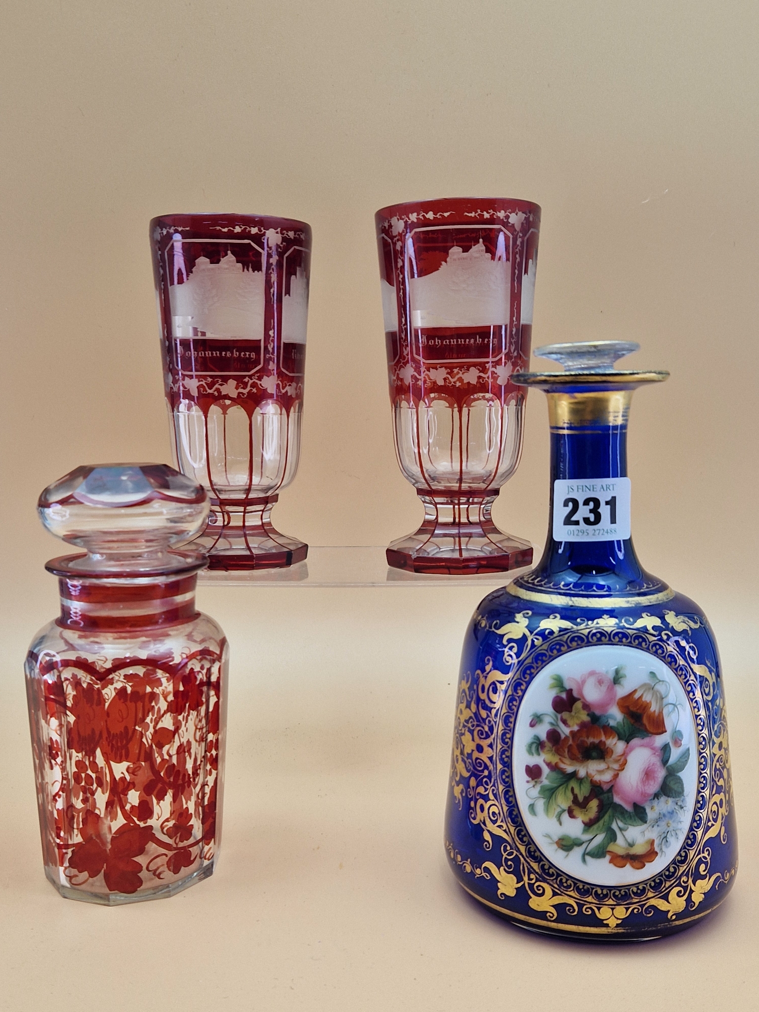 A PAIR OF BOHEMIAN RUBY OVERLAY VASES ENGRAVED WITH VIEWS OF RHEINSTEIN, JOHANNESBERG AND OTHER