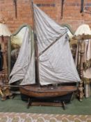 A MODEL SAILING BARGE THE MAST WITH FIVE SAILS UP, FROM STERN TO BOW SPRIT. 172cms.