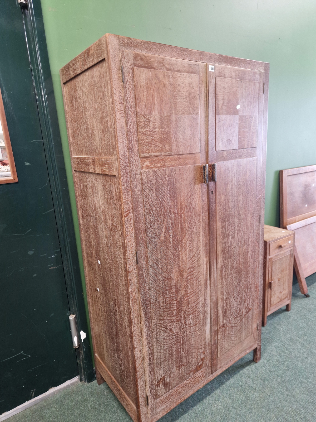 AN ART DECO LIMED OAK BEDROON SUITE COMPRISING LARGE WARDROBE, A TALLBOY, TWO BEDSIDE CABINETS AND A - Image 2 of 5