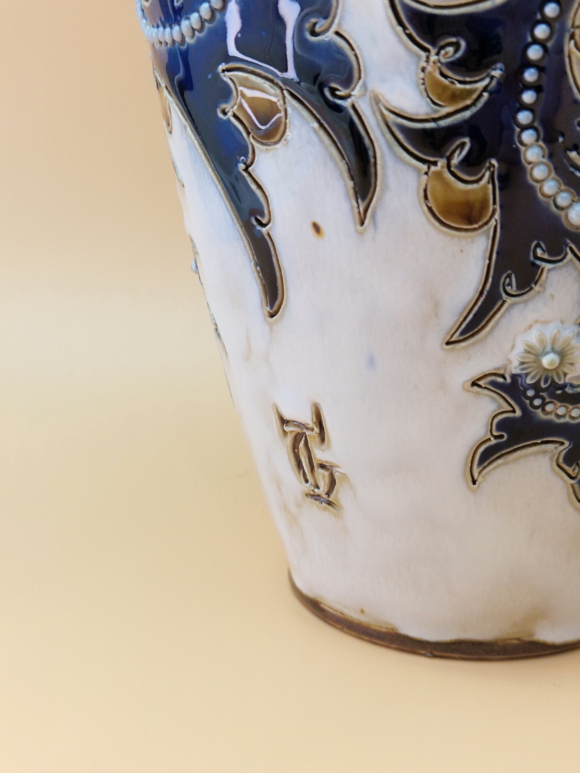 A PAIR OF ROYAL DOULTON VASES BY GEORGE TINWORTH DECORATED IN RELIEF WITH BEADED BLUE VINES - Image 6 of 8