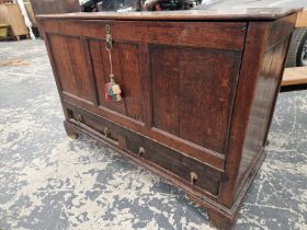 AN 18th C. OAK MULE CHEST LATER CONVERTED WITH A PULL DOWN THREE PANELLED FRONT OVER TWO DRAWERS,