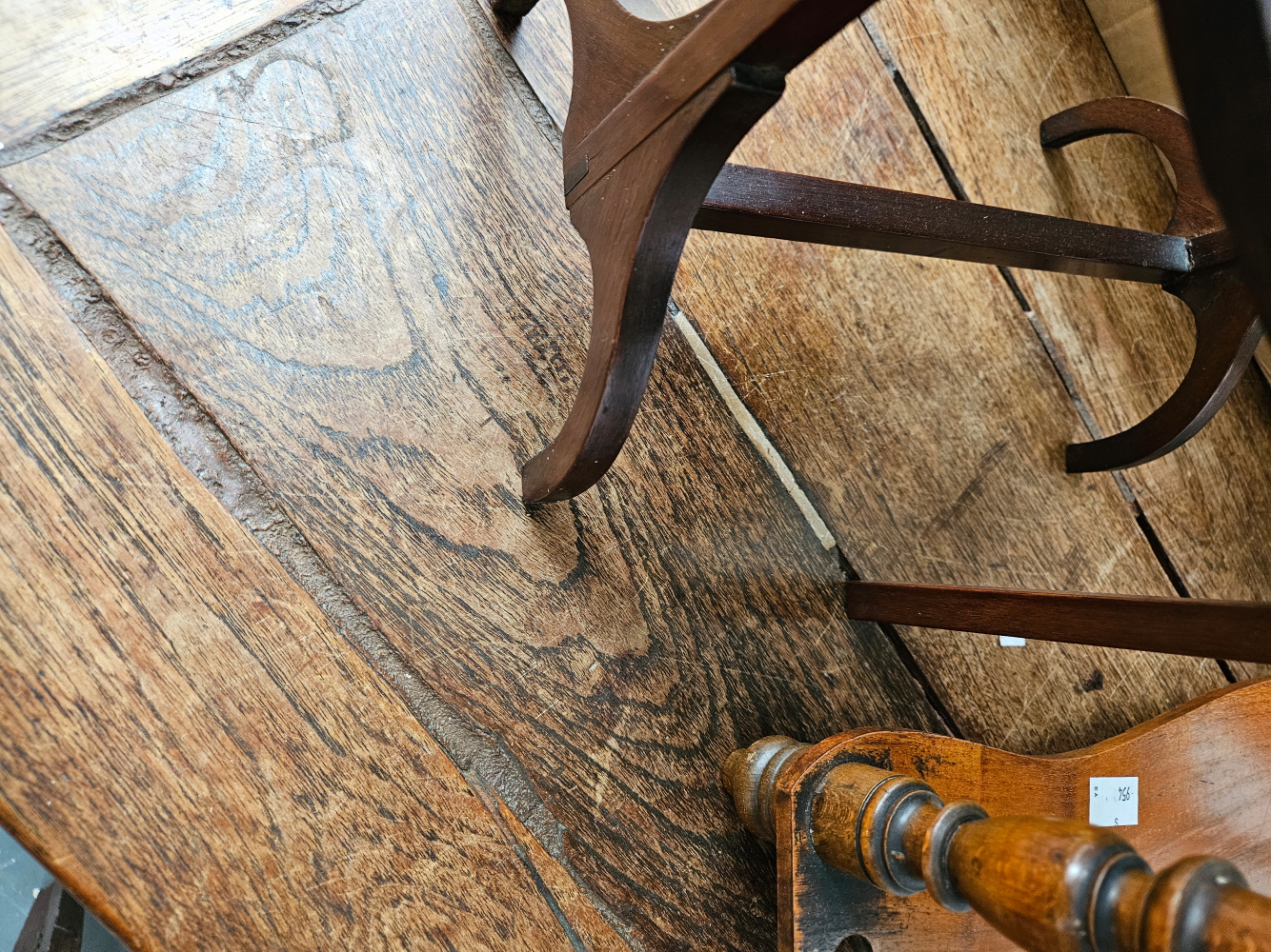A TEAK AND PINE REFECTORY TABLE, THE CLEATED RECTANGULAR PLANK TOP ON PAIRS OF LEGS TO EACH NARROW - Image 12 of 14