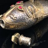 A 19th CENTURY EASTERN GILDED SILVER ARTICULATED FISH FORM POWDER FLASK. THE ANTHROPOMORPHISED