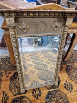 A BEVELLED GLASS RECTANGULAR MIRROR IN A REGENCY GILT FRAME, THE SIDES WITH SPIRAL TWIST COLUMNS