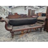 A VICTORIAN MAHOGANY SHOW FRAME SETTEE WITH AN ANTHEMION MOTIF CRESTING THE BACK
