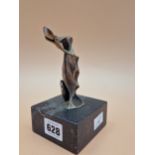 FELIPE GONZALEZ, A CONTEMPORARY BRONZE FIGURE OF A LADY DANCING ON A BLACK STONE BLOCK. H 14cms.