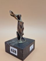 FELIPE GONZALEZ, A CONTEMPORARY BRONZE FIGURE OF A LADY DANCING ON A BLACK STONE BLOCK. H 14cms.