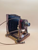 A THORNTON PICKARD MAHOGANY CASED PLATE CAMERA