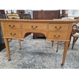 AN ANTIQUE PINE DRESSING TABLE WITH 5 DRAWERS ON SQUARE TAPER LEGS.