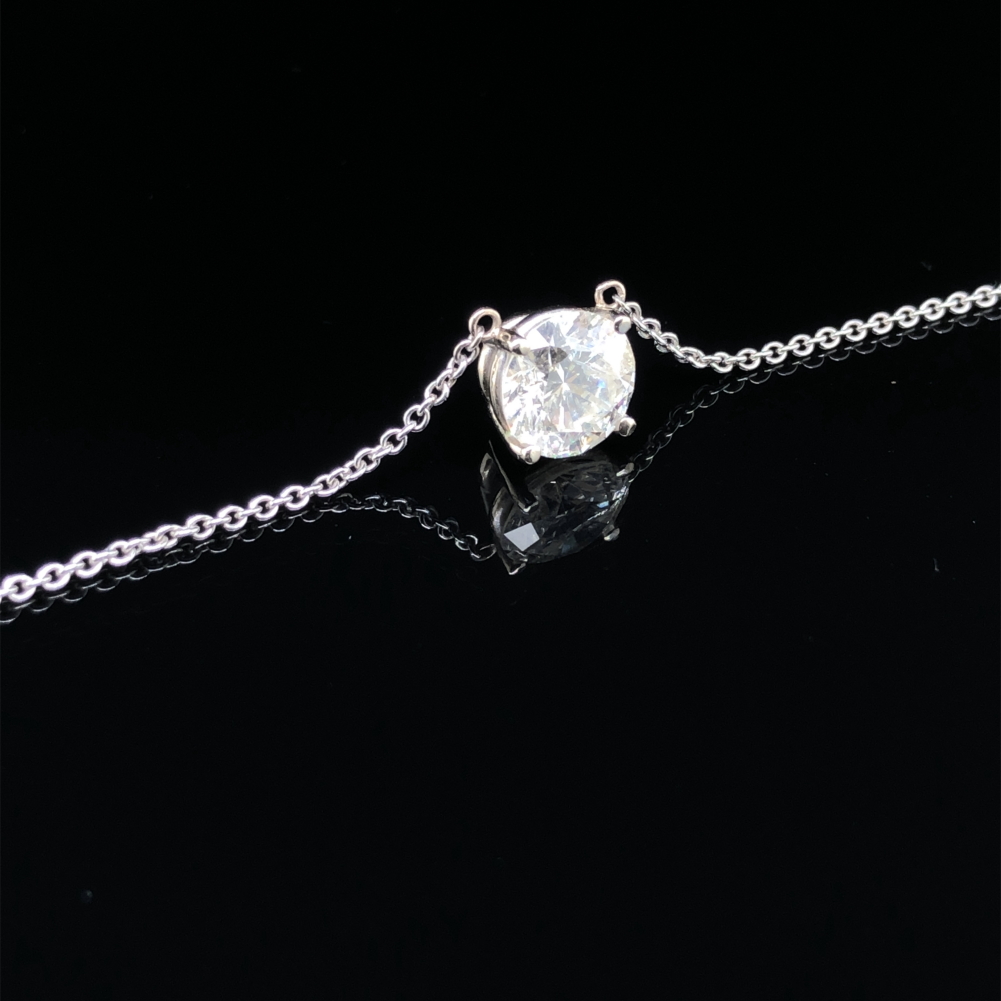 A DIAMOND SINGLE STONE PENDANT. THE ROUND BRILLIANT CUT DIAMOND IN A FOUR CLAW SETTING. MEASUREMENTS - Image 2 of 2