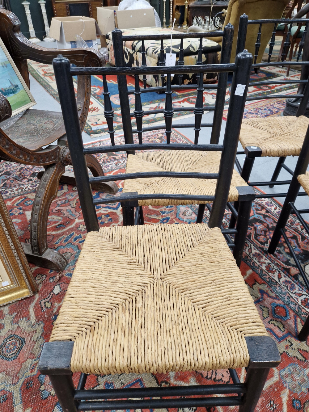 A SET OF FOUR WILLIAM MORRIS EBONISED CHAIRS WITH RUSH SEATS - Image 2 of 16