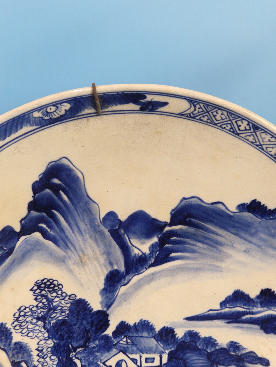 A PAIR OF CHINESE BLUE AND WHITE CHARGERS PAINTED WITH MOUNTAINOUS ISLANDS, A BUFFALO ON ONE AND A - Image 10 of 14