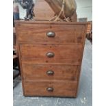 A W M NICHOLSON OF LEEDS TEAK CHEST OF FOUR DRAWERS WITH BRASS CUP HANDLES AND COMPARTMENTAL