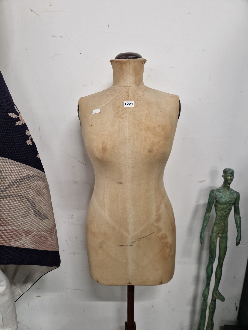 A VINTAGE DRESS MAKERS DUMMY