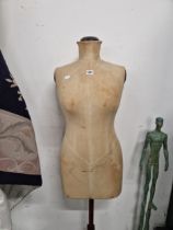 A VINTAGE DRESS MAKERS DUMMY