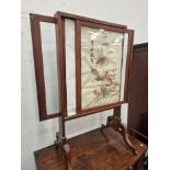 AN EBONY LINE INLAID MAHOGANY FIRE SCREEN WITH SLIDING GLASS PANELS AND A CHINESE PANEL