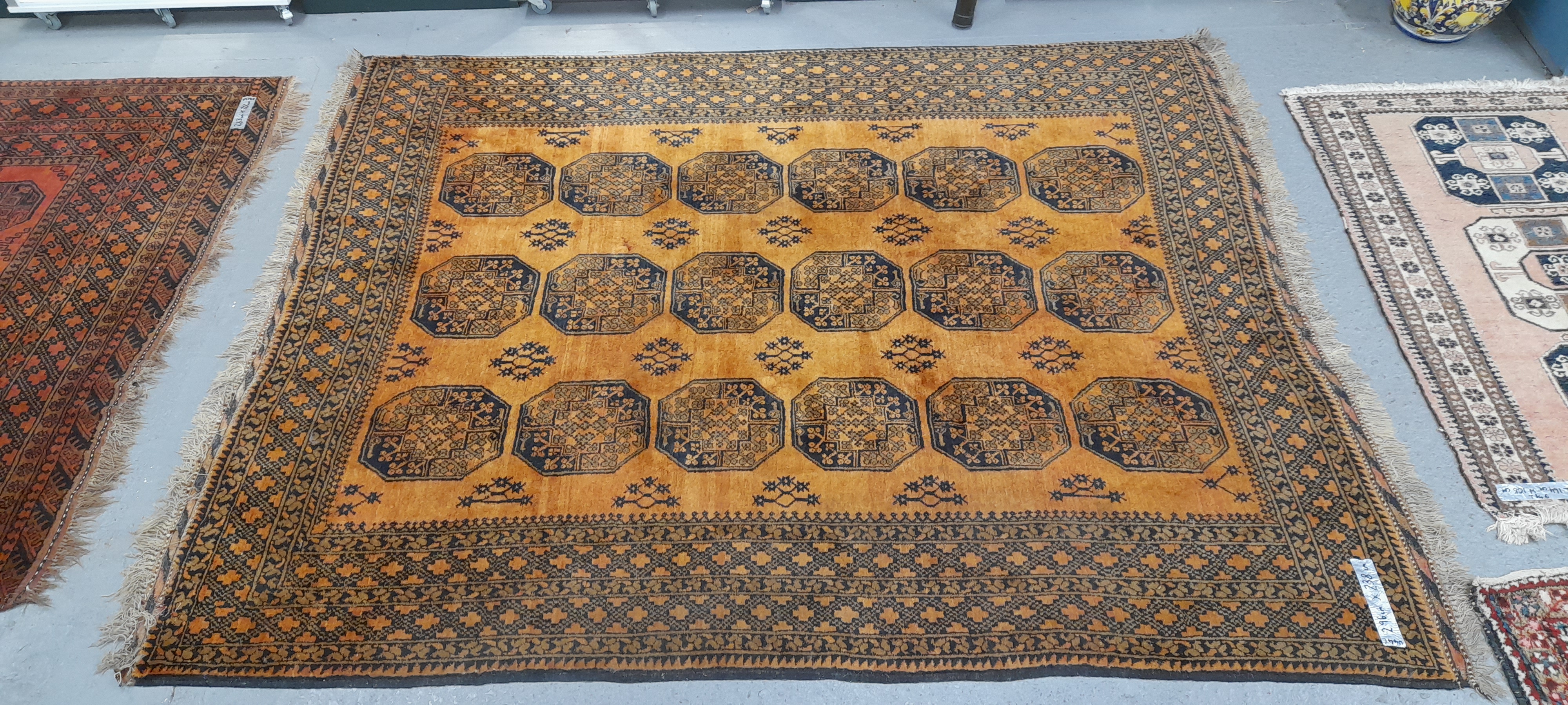 AN AFGHAN BOKHARA CARPET 296 x 238 cm