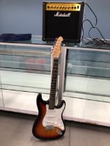 AN ARIA STRATOCASTER STYLE ELECTRIC GUITAR TOGETHER WITH A MARSHALL MG15CDR AMPLIFIER - BOXED.