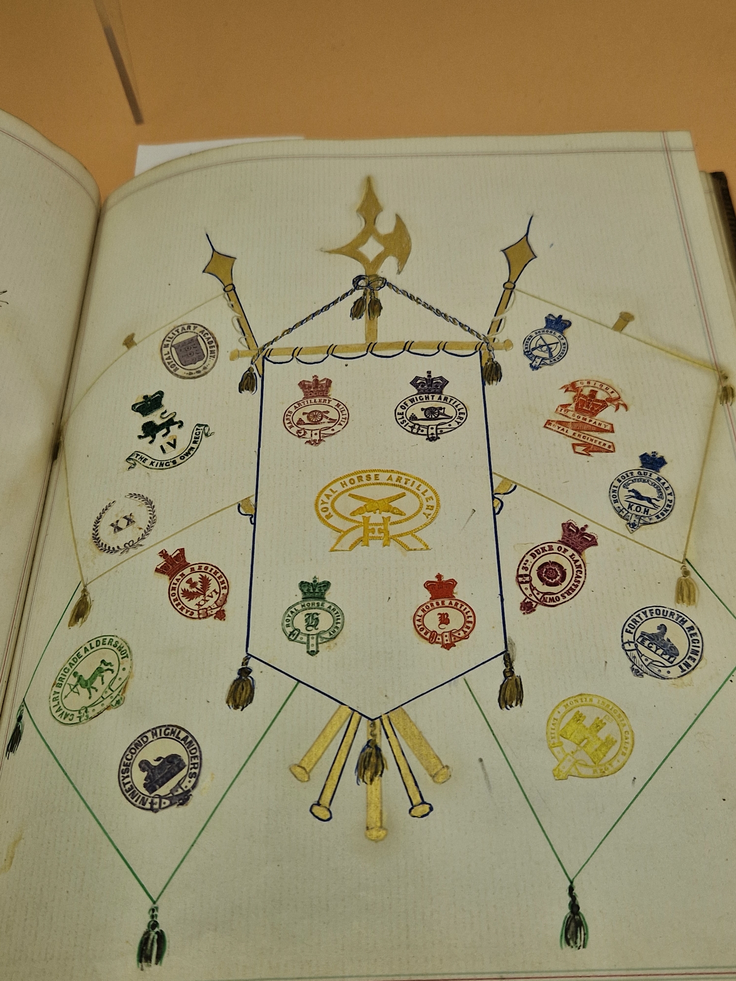 A LATE VICTORIAN GREEN LEATHER BOUND ALBUM OF ROYAL, MILITARY, NAVAL COLLEGE, AND PERSONAL CRESTS, - Image 12 of 14