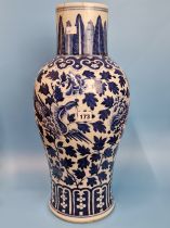 A CHINESE BLUE AND WHITE BALUSTER VASE PAINTED WITH TWO PHOENIX AMONGST PEONIES BELOW A STIFF LEAF