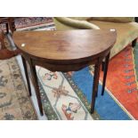 A MAHOGANY D-SHAPED GAMES TABLE OPENING ON ONE OF THE TAPERING SQUARE LEGS. W 75 x D 37 CLOSED x H